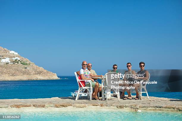 friends enjoying a magic greek panorama - blue sky friends stock pictures, royalty-free photos & images