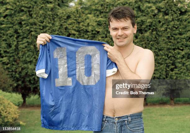 Former England midfield player Steve Hodge with the infamous Argentina shirt worn by Diego Maradona in the 1986 World Cup quarter-final against...