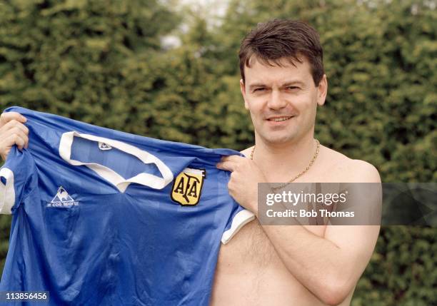 Former England midfield player Steve Hodge with the infamous Argentina shirt worn by Diego Maradona in the 1986 World Cup quarter-final against...