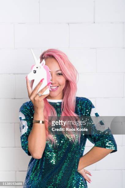 woman with pink hair - phone cover stock pictures, royalty-free photos & images