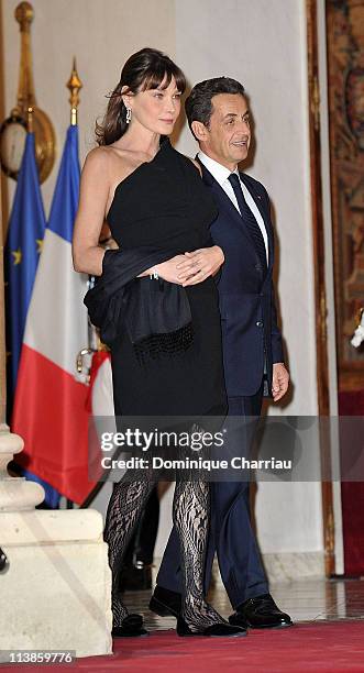 French President Nicolas Sakozy and wife Carla Bruni-Sarkozy are seen at Elysee Palace as they wait for South African President Jacob Zuma and wife...