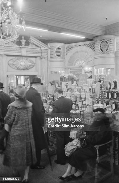 Customers in Fortnum & Mason, a London emporium, 1955.