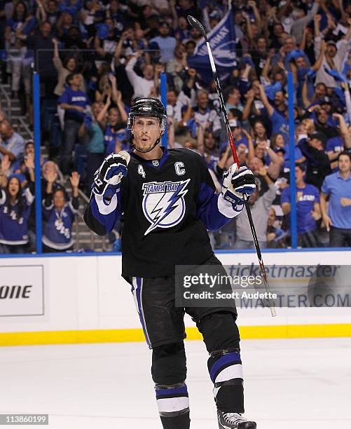Vincent Lecavalier of the Tampa Bay Lightning reacts after Ryan Malone scored a goal against the Washington Capitals in Game Four of the Eastern...