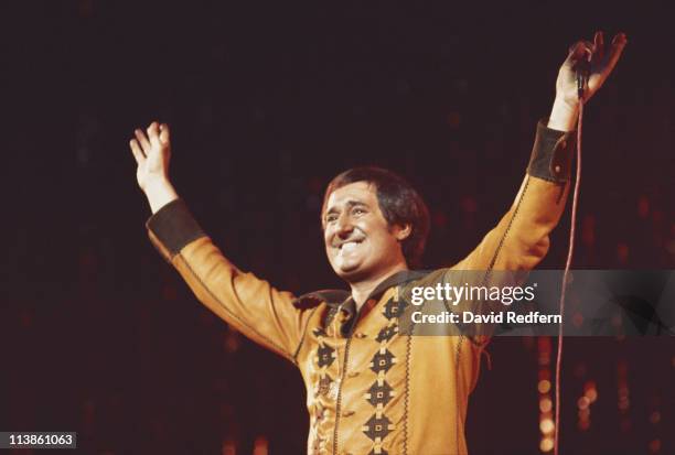 Neil Sedaka, U.S. Pianist and singer-songwriter, holding his hands in the air to greet the audience during a live concert performance at the New...