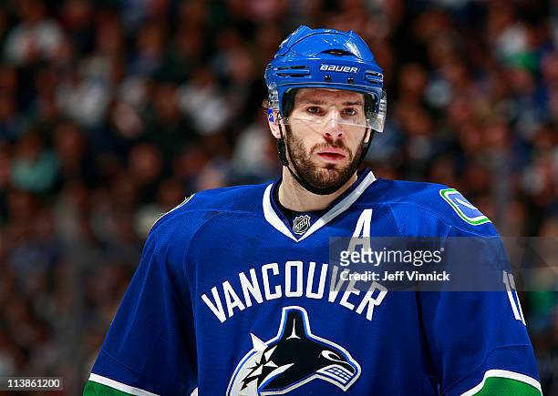 Ryan Kesler of the Vancouver Canucks looks on from the bench against the Nashville Predators in Game Five of the Western Conference Semifinal of the...