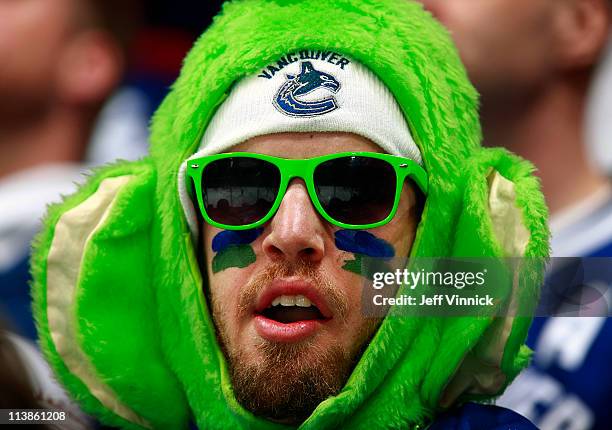 Vancouver Canucks fan watches the game between the Vancouver Canucks and the Nashville Predators in Game Five of the Western Conference Semifinal...