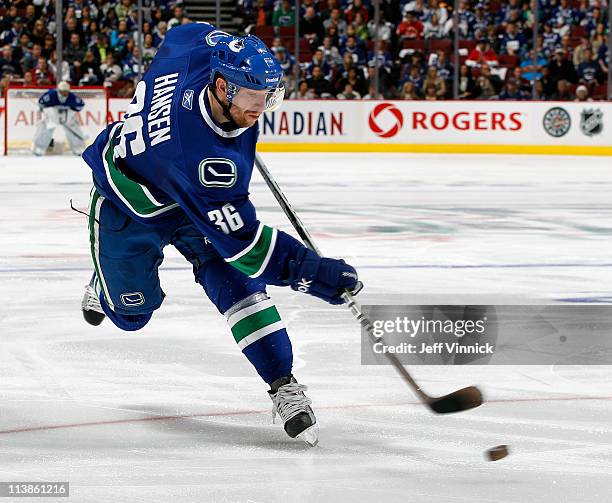 Jannik Hansen of the Vancouver Canucks takes a slap shot in Game Five of the Western Conference Semifinal against the Nashville Predators in the 2011...