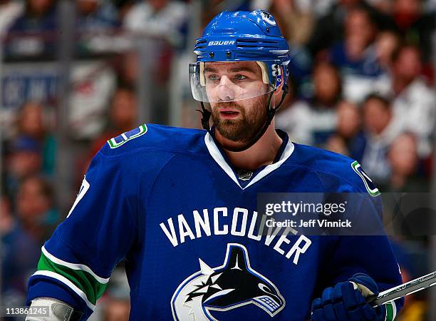 Chris Higgins of the Vancouver Canucks looks on from the bench in Game Five of the Western Conference Semifinal against the Nashville Predators in...