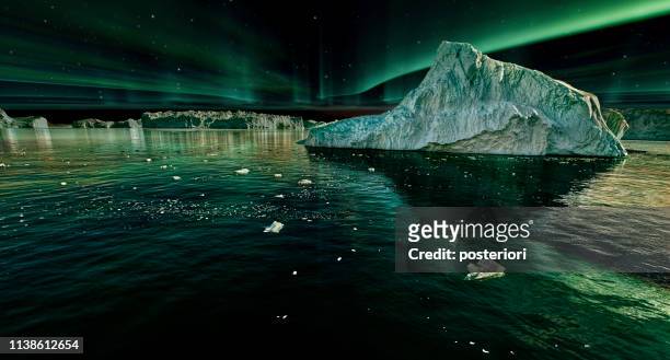 isberg flytande i grönlandsfjorden på natten med grönt norrsken - iceberg bildbanksfoton och bilder
