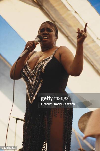 Linda Hopkins, U.S. Blues and gospel singer, singing into a microphone during a live concert performance at the New Orleans Jazz and Heritage...