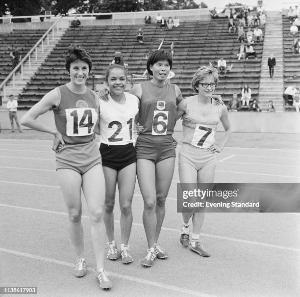 British sprinter Dorothy Hyman, British sprinter Anita Neil, Chinese track and field athlete Chi Cheng, and British sprinter Madeleine Cobb at...