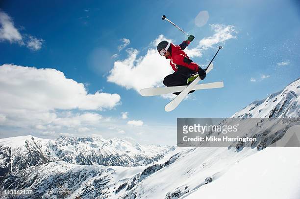 male skier jumping off bansko cornice - schifahren stock-fotos und bilder