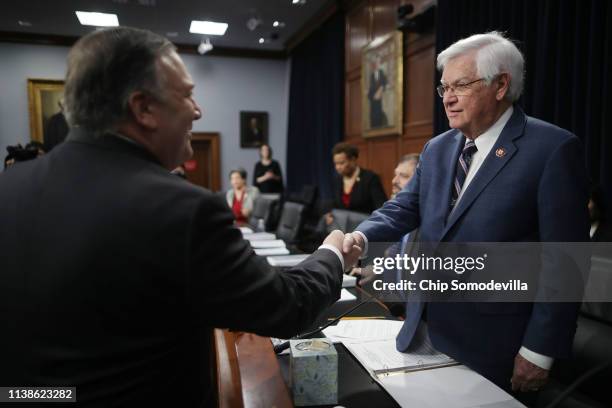 Secretary of State Mike Pompeo greets the House Appropriations Committee's State, Foreign Operations and Related Programs subcommittee ranking member...