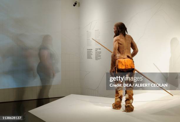 Statue reproducing Otzi, South Tyrol Museum of Archaeology, Bolzano, Trentino-Alto Adige, Italy.