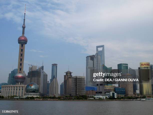 View of the skyscrapers, including the Oriental Pearl Tower, La Jin Mao Tower and the Shanghai World Financial Center, Pudong economic district ,...