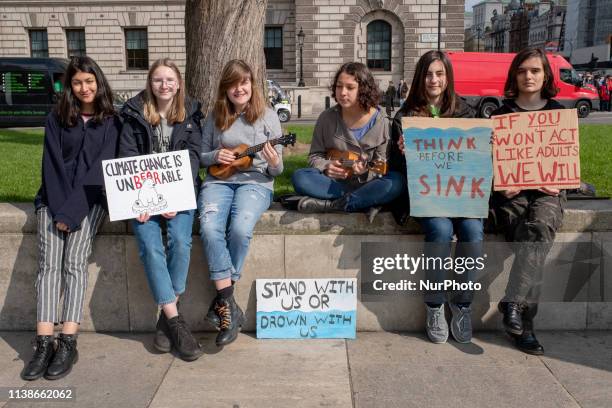 Student protesters hold a sit down demonstration at the YouthStrike4Climate student march at Oxford Circus on April 12, 2019 in London, United...