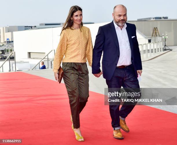 This picture taken on May 27, 2018 shows Bestseller-owner Anders Holch Povlsen and his wife Anne Holch Povlsen as they arrive at the celebration of...