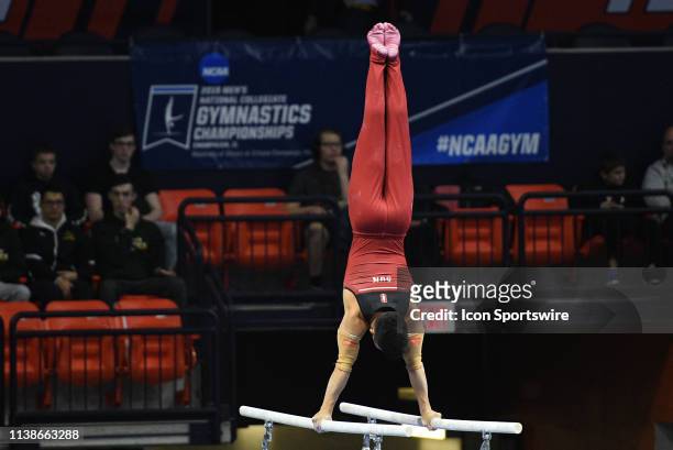 Stanford Cardinal gymnast Blake Sun does a handstand on the parallel bars during the NCAA Men's Gymnastics Championship on April 19 at the State Farm...