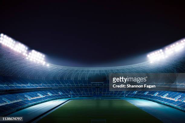 view of empty stadium at night - soccer field empty night imagens e fotografias de stock