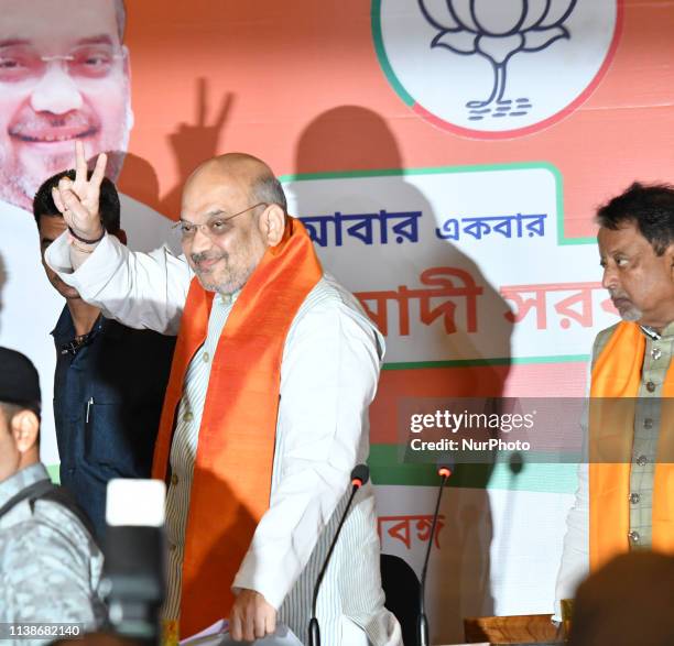 National President Amit Shah showing victory Singh along Mukul Roy at the Meet the Press on April 22,2019 in Kolkata,,India.