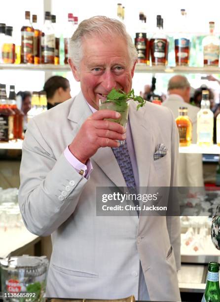 Prince Charles, Prince of Wales enjoys a mojito as he and Camilla, Duchess of Cornwall visit a paladar called Habanera, a privately owned restaurant...