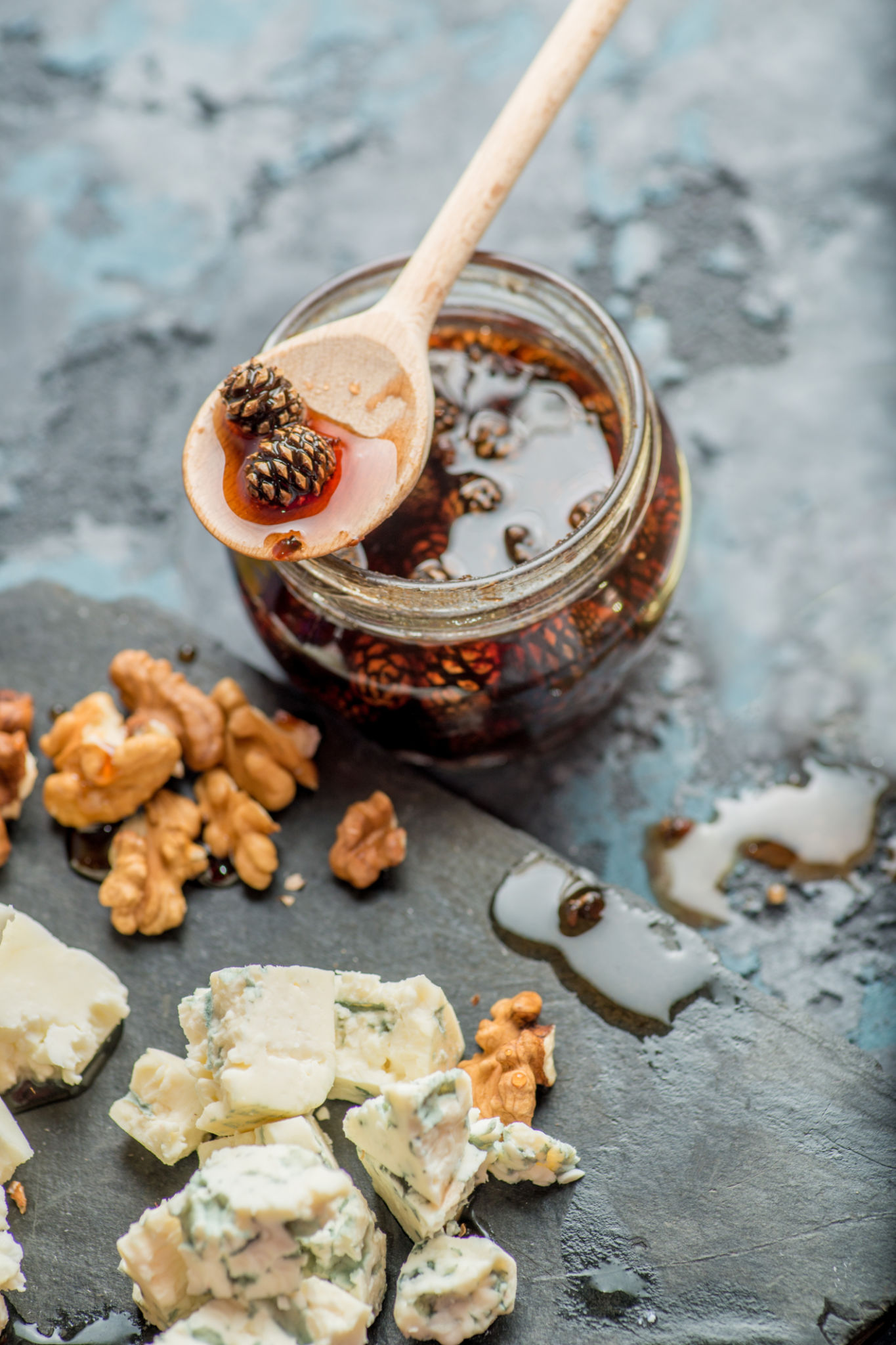various cheeses on a plate with sauces and
confitures, honey and nuts various cheeses on a plate with sauces and
confitures, honey and nuts