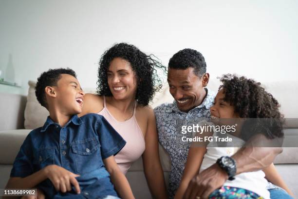 afro latin family portrait at home - brazilian culture stock pictures, royalty-free photos & images