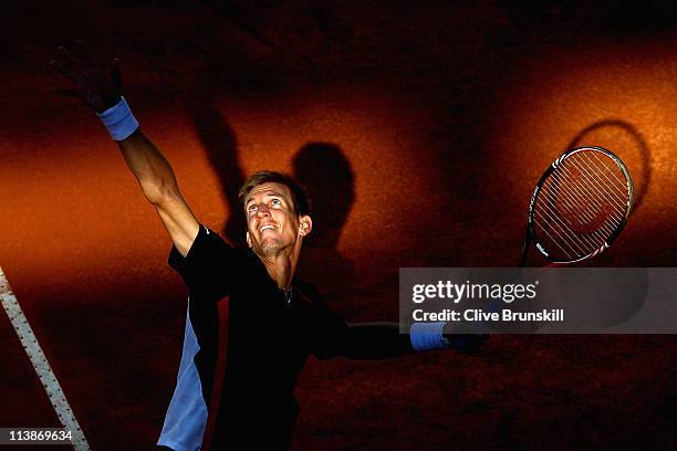 Jarkko Nieminen of Finland serves during his first round match against Adrian Mannarino of France during day two of the Internazoinali BNL D'Italia...