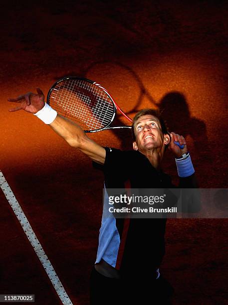 Jarkko Nieminen of Finland serves during his first round match against Adrian Mannarino of France during day two of the Internazoinali BNL D'Italia...