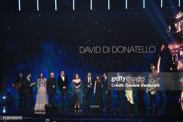 Member of the casti A casa tutti bene receive the David Dello Spettatore award during the 64. David Di Donatello - Award Ceremony on March 27, 2019...