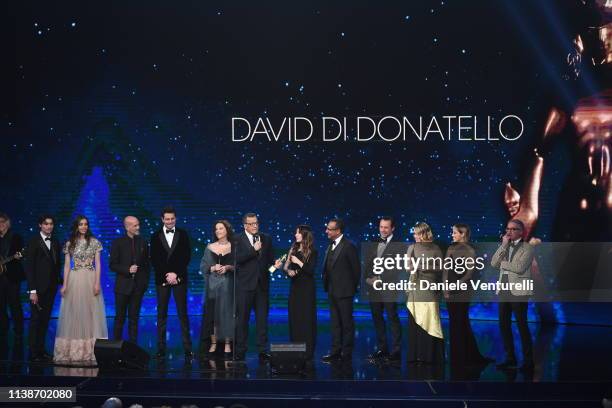 Member of the casti A casa tutti bene receive the David Dello Spettatore award during the 64. David Di Donatello - Award Ceremony on March 27, 2019...