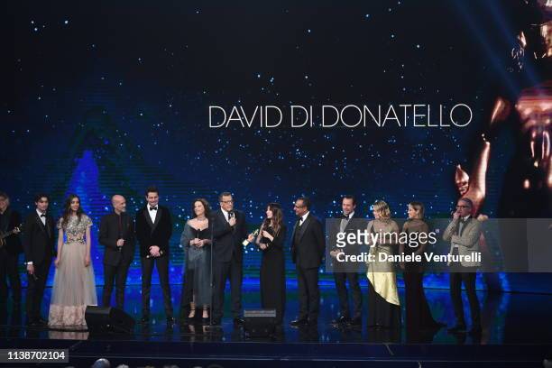 Member of the casti A casa tutti bene receive the David Dello Spettatore award during the 64. David Di Donatello - Award Ceremony on March 27, 2019...
