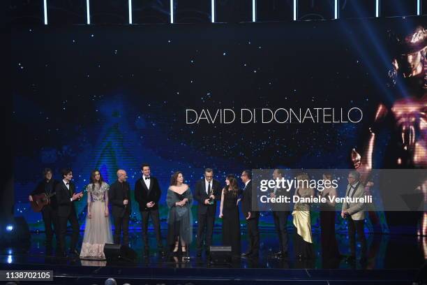 Member of the casti A casa tutti bene receive the David Dello Spettatore award during the 64. David Di Donatello - Award Ceremony on March 27, 2019...