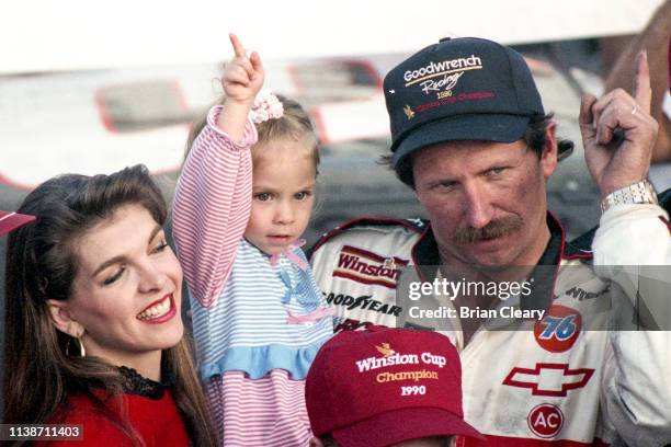 Dale Earnhardt celebrates his 4th NASCAR Winston Cup Championship with wife Teresa Earnhardt and daughter Taylor Earnhardt after the Atlanta Journal...