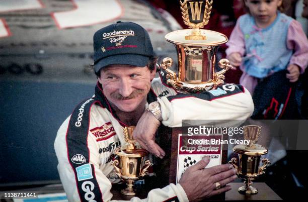 Dale Earnhardt celebrates his 4th NASCAR Winston Cup Championship after the Atlanta Journal 500, NASCAR Winston Cup race, Atlanta Motor Speedway on...