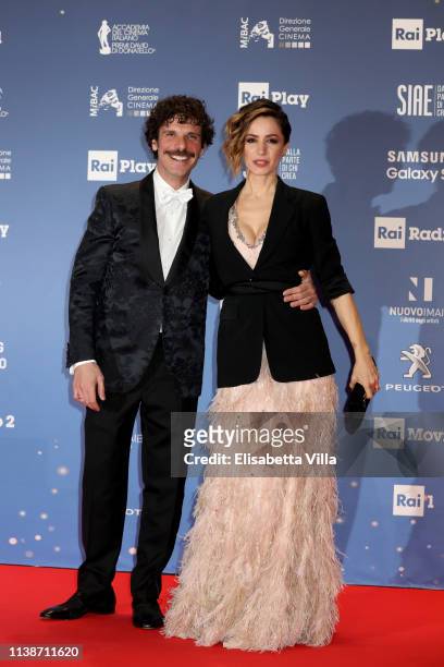 Francesco Montanari and Andrea Delogu attend the 64. David Di Donatello awards on March 27, 2019 in Rome, Italy.
