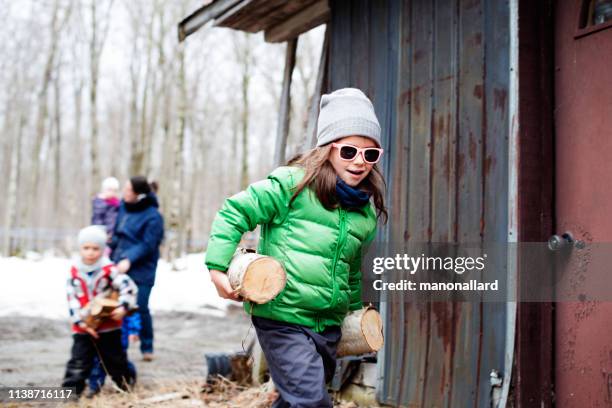 maple syrup family industry time with multi-generational family - sugar shack stock pictures, royalty-free photos & images