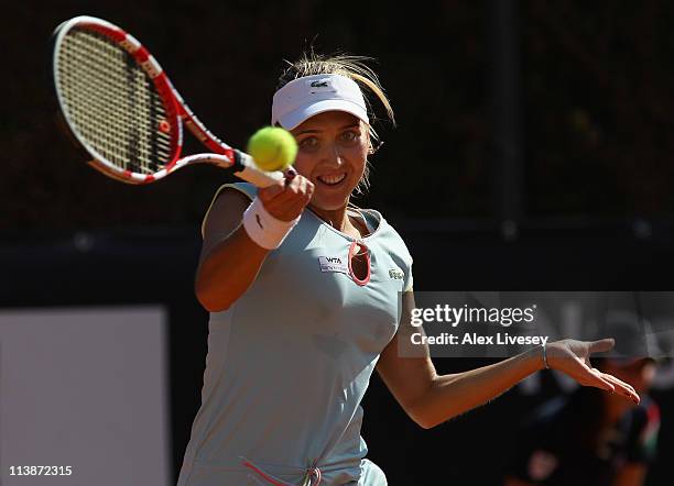 Elena Vesnina of Russia hits a forehand return during her match against Tamira Paszek of Austria during day two of the Internazionali BNL d'Italia at...