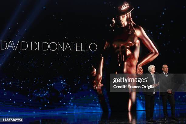 Piera Detassis and Carlo Conti on the stage during the 64. David Di Donatello Award Ceremony on March 27, 2019 in Rome, Italy.