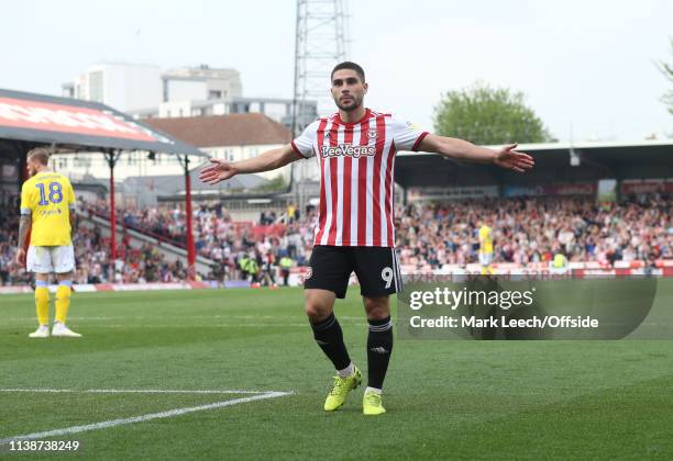 Neal Maupay of Brentford celebrates the opening goal in front of the Leeds supporters during the Sky Bet Championship match between Brentford FC and...