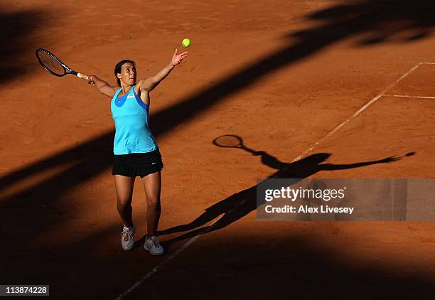 Marion Bartoli of France serves during her first round victory over Arantxa Parra Santonja of Spain during day two of the Internazionali BNL d'Italia...