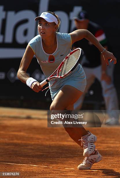 Elena Vesnina of Russia runs for the ball during her match against Tamira Paszek of Austria during day two of the Internazionali BNL d'Italia at the...