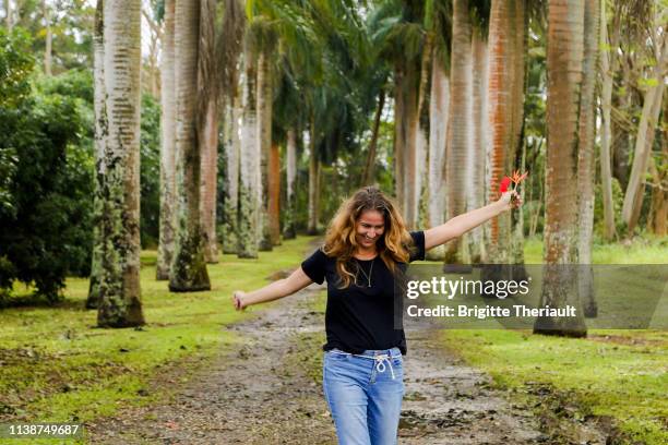 mid-age women having good time in hawaii. freedom lifestyle. - tall blonde women stock pictures, royalty-free photos & images