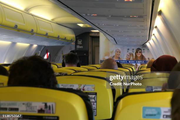Inside a Ryanair low cost budget airline in the European route FR1818 from Thessaloniki Makedonia Airport SKG LGTS in Greece to Eindhoven Airport EIN...