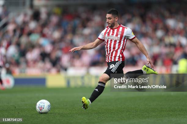 Neal Maupay of Brentford about to score the opening goal during the Sky Bet Championship match between Brentford FC and Leeds United at Griffin Park...