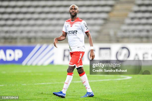 Eden Massouema of Valenciennes thanks the crowd during the Ligue 2 match between Paris FC and Valenciennes FC at Stade Charlety on April 22, 2019 in...