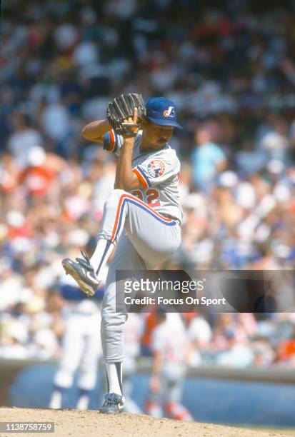 Dennis Martinez of the Montreal Expos pitches against the Chicago Cubs during an Major League Baseball game circa 1992 at Wrigley Field in Chicago,...