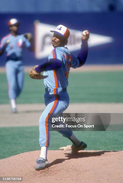 Dennis Martinez of the Montreal Expos pitches against the New York Mets during an Major League Baseball game circa 1986 at Shea Stadium in the Queens...