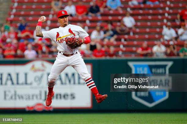 Kolten Wong of the St. Louis Cardinals throws to first base against the Milwaukee Brewers in the first inning at Busch Stadium on April 22, 2019 in...