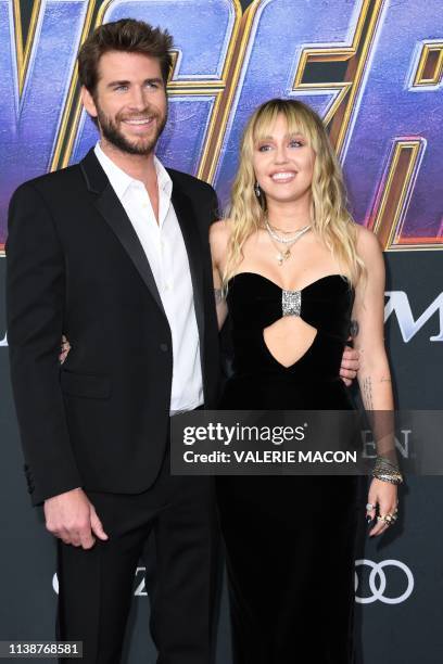 Singer Miley Cyrus and Australian actor Liam Hemsworth arrive for the World premiere of Marvel Studios' "Avengers: Endgame" at the Los Angeles...